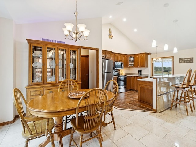 dining space featuring light tile patterned flooring, baseboards, visible vents, and a chandelier