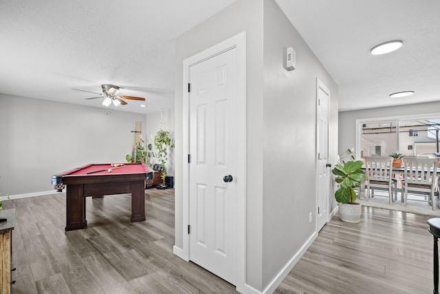 game room with pool table, a ceiling fan, baseboards, and wood finished floors