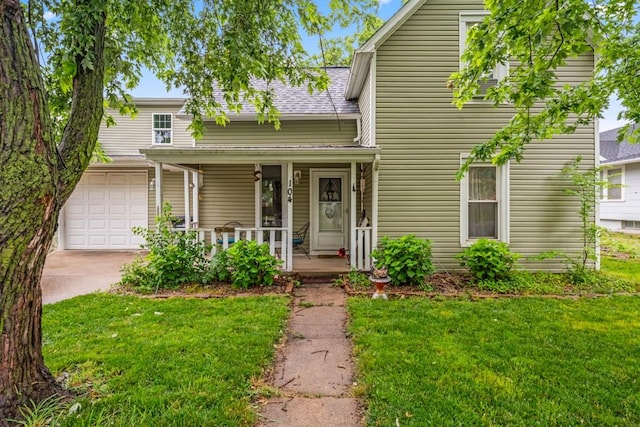 traditional-style house featuring an attached garage, covered porch, a shingled roof, a front lawn, and concrete driveway