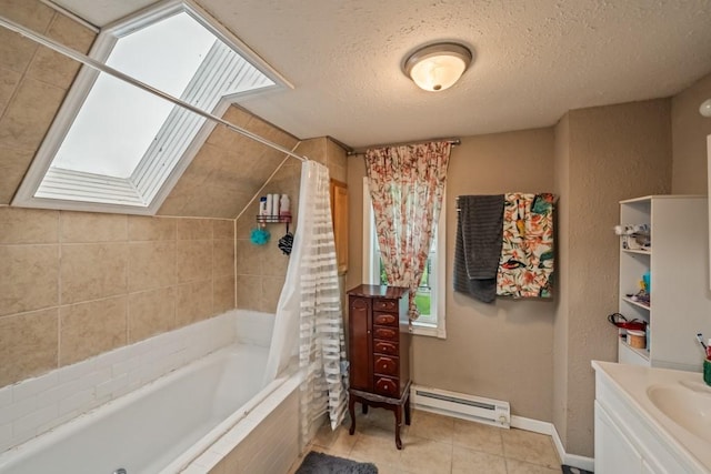 full bath featuring tile patterned flooring, baseboards, tiled shower / bath combo, a textured ceiling, and a baseboard radiator