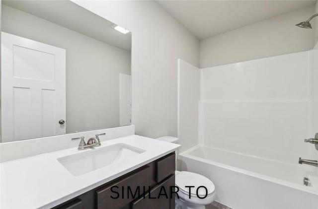 full bathroom featuring vanity, toilet, and bathing tub / shower combination