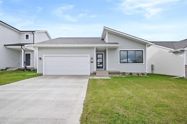 view of front of house featuring driveway, a front lawn, an attached garage, and a shingled roof