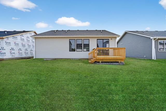 1811 Tuscany Dr SE, Altoona, IA 50009 - rear view of property featuring a wooden deck and a lawn