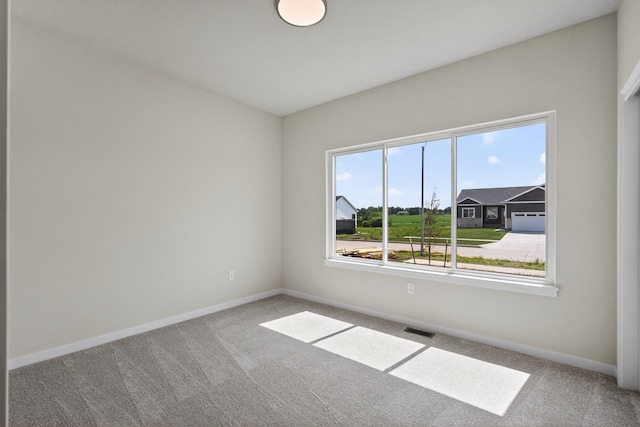 1811 Tuscany Dr SE, Altoona, IA 50009 - carpeted empty room featuring baseboards