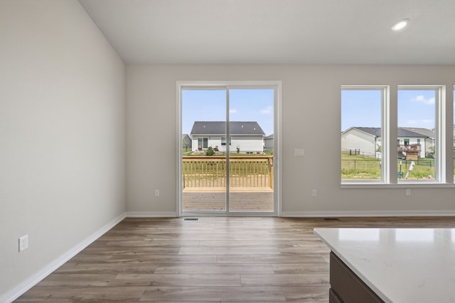 1811 Tuscany Dr SE, Altoona, IA 50009 - unfurnished dining area with wood finished floors and recessed lighting