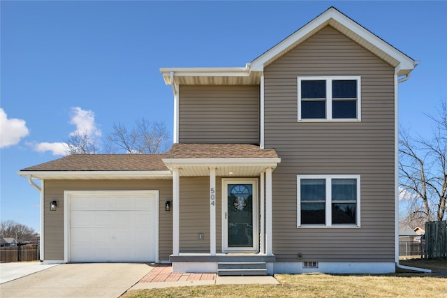 traditional home featuring an attached garage, a shingled roof, driveway, and fence