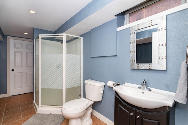 full bathroom featuring tile patterned floors, toilet, and a shower stall