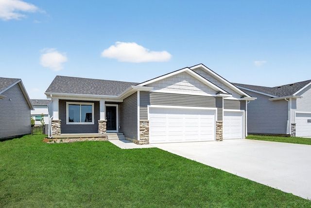 1803 Tuscany Dr SE, Altoona, IA 50009 - craftsman house with a garage, stone siding, driveway, and a front lawn