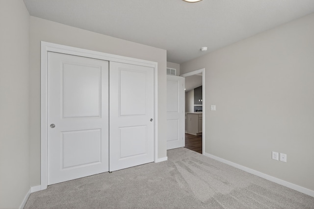 1803 Tuscany Dr SE, Altoona, IA 50009 - unfurnished bedroom with carpet and a closet