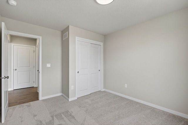 1803 Tuscany Dr SE, Altoona, IA 50009 - unfurnished bedroom with carpet flooring and a closet