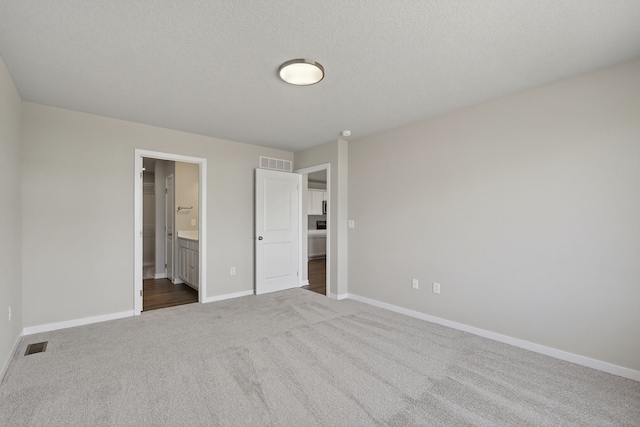 1803 Tuscany Dr SE, Altoona, IA 50009 - unfurnished bedroom featuring carpet floors and ensuite bath