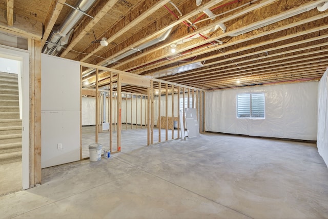 1803 Tuscany Dr SE, Altoona, IA 50009 - below grade area featuring stairway