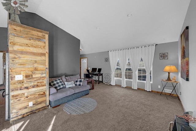 living room featuring vaulted ceiling, carpet, and baseboards