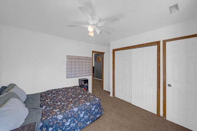 bedroom featuring a closet, a ceiling fan, and carpet flooring