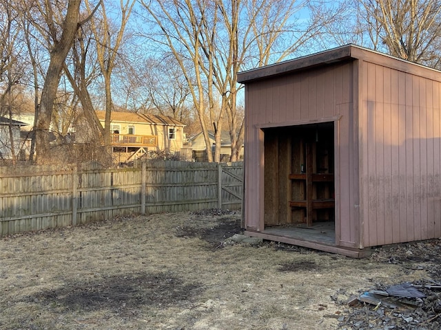 view of shed with fence