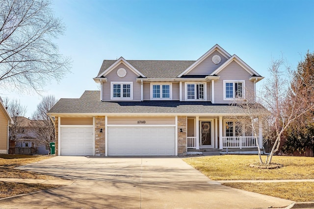 craftsman inspired home with stone siding, covered porch, driveway, and a shingled roof