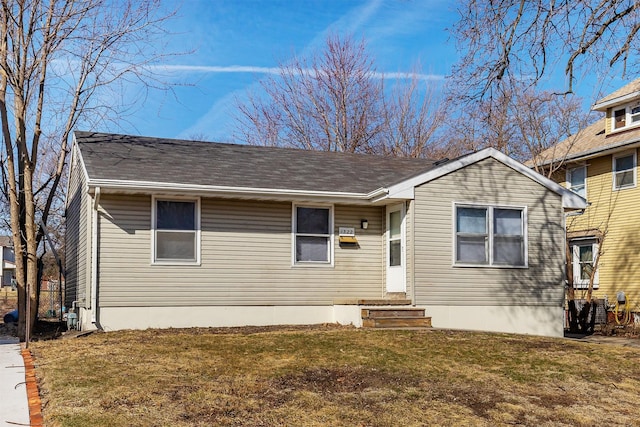 view of front of home with a front yard