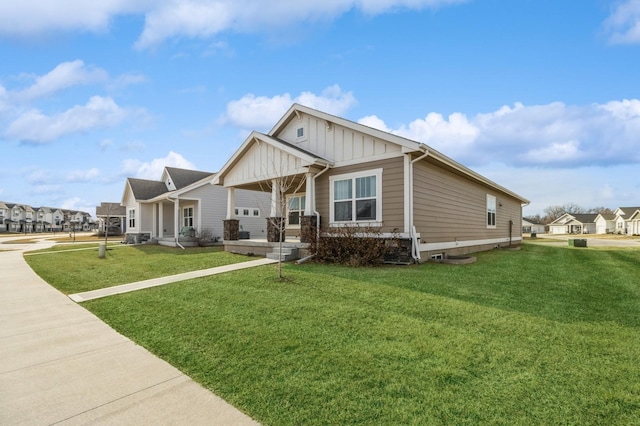 view of front of house featuring a front lawn, a porch, board and batten siding, and a residential view