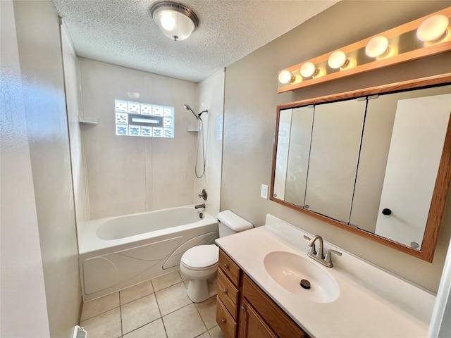 full bath featuring tile patterned floors, toilet, a textured ceiling, tub / shower combination, and vanity