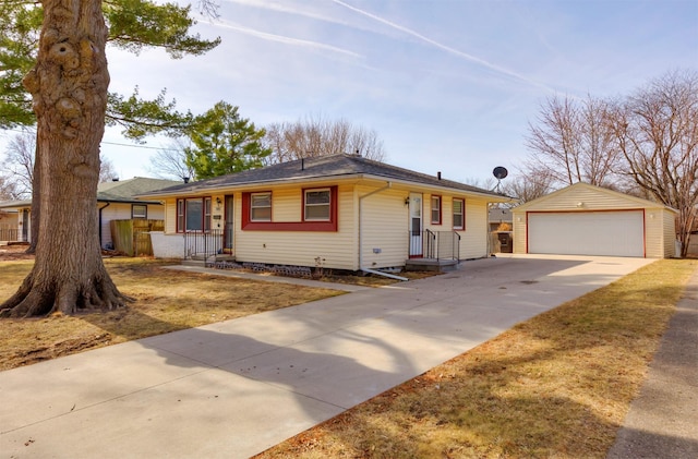 ranch-style home with an outbuilding and a detached garage