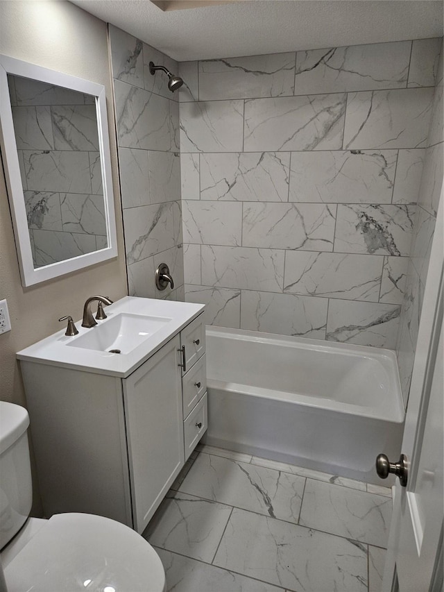 bathroom featuring vanity,  shower combination, a textured ceiling, toilet, and marble finish floor