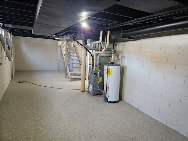 unfinished basement featuring water heater, stairway, and heating unit