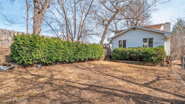 view of yard with fence