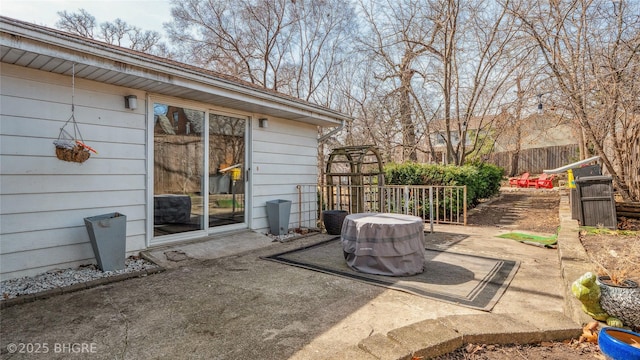 view of patio with fence