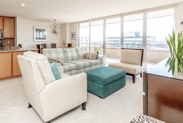 living room featuring recessed lighting, expansive windows, a view of city, and light colored carpet