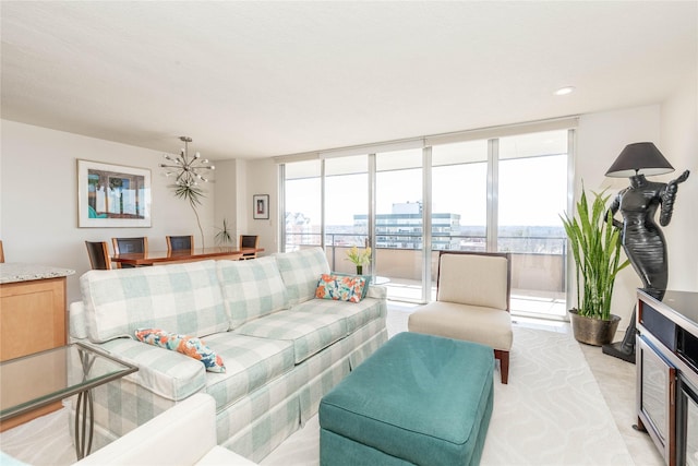 living area with a wall of windows and a healthy amount of sunlight