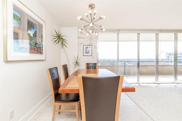 dining space featuring baseboards, floor to ceiling windows, a chandelier, and light tile patterned flooring