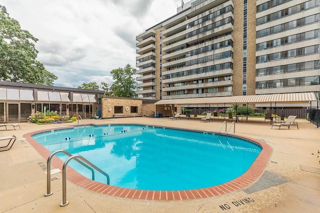 community pool featuring a patio