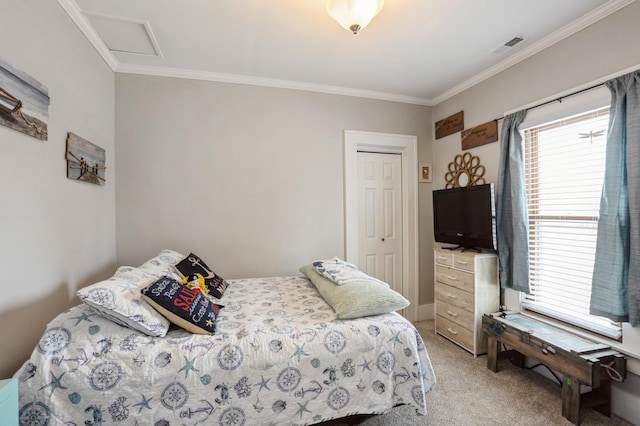 bedroom featuring light carpet, multiple windows, attic access, and ornamental molding