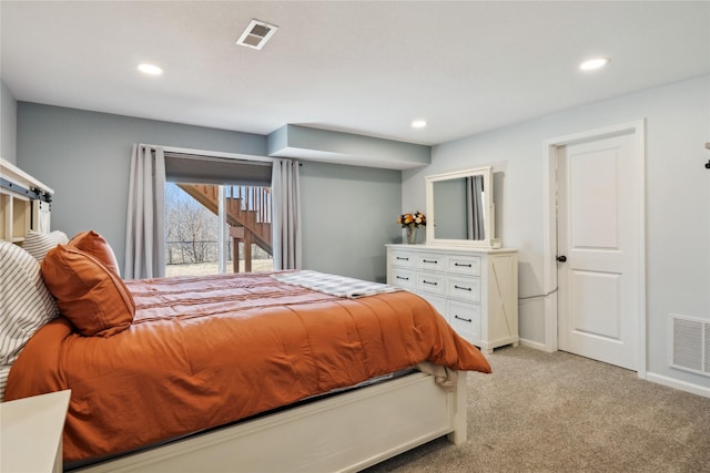 bedroom with recessed lighting, visible vents, and light carpet