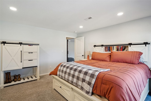 bedroom featuring recessed lighting, visible vents, light colored carpet, and baseboards