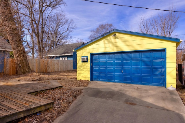 detached garage with fence