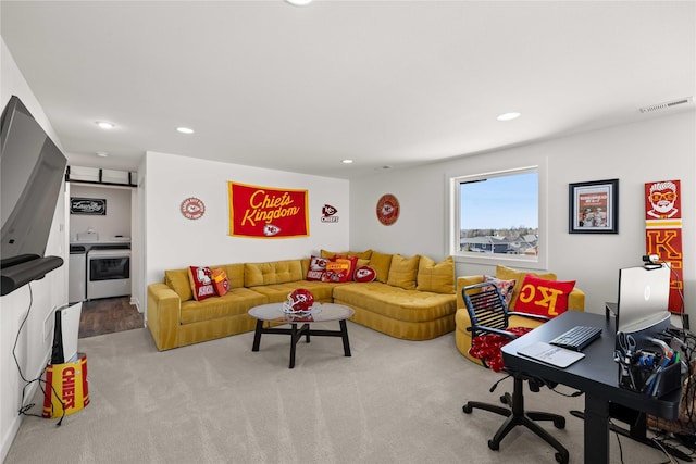 living area featuring carpet, recessed lighting, and visible vents