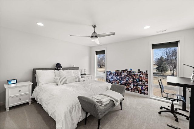 bedroom featuring carpet flooring, multiple windows, recessed lighting, and visible vents