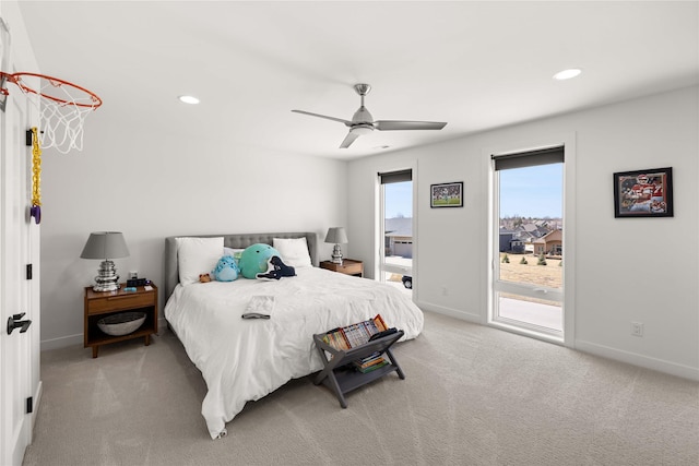 bedroom with access to outside, recessed lighting, light colored carpet, and baseboards