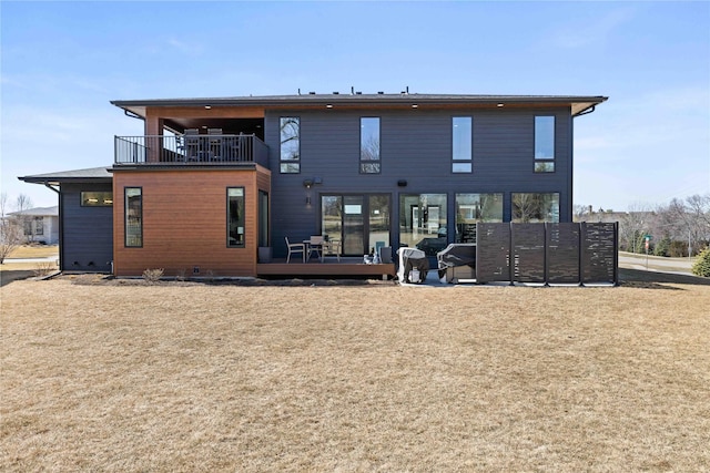 back of house with a balcony