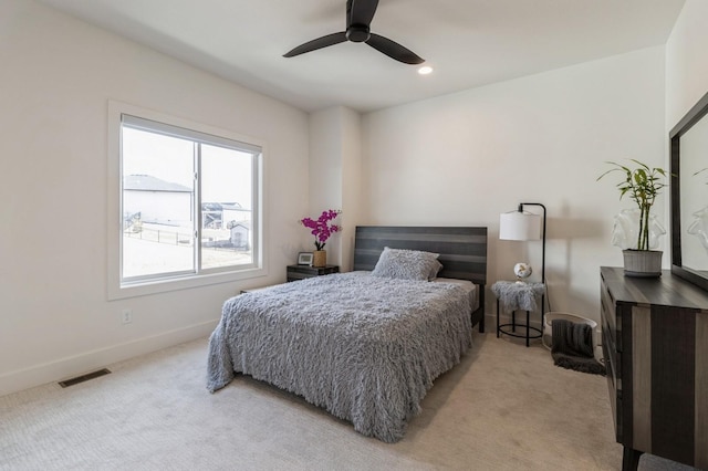 bedroom with visible vents, recessed lighting, baseboards, light colored carpet, and ceiling fan