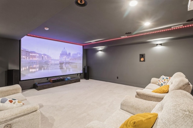 cinema room with carpet and baseboards