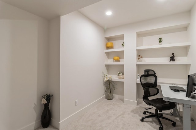 home office featuring recessed lighting, baseboards, built in shelves, and carpet flooring