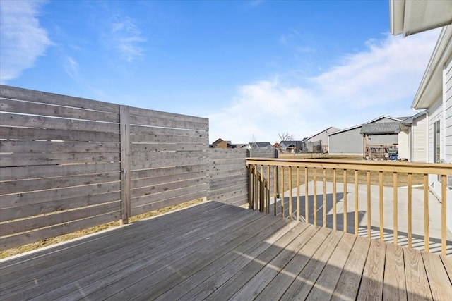 wooden terrace featuring a residential view