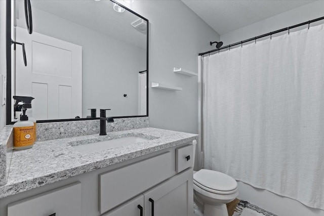 full bathroom featuring visible vents, toilet, vanity, and shower / bathtub combination with curtain