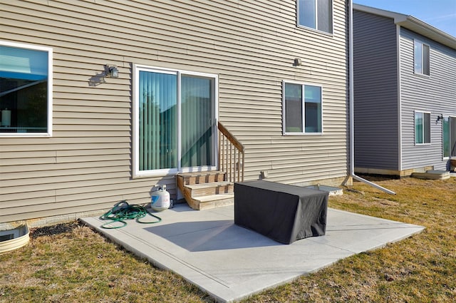 entry to storm shelter featuring entry steps and a yard