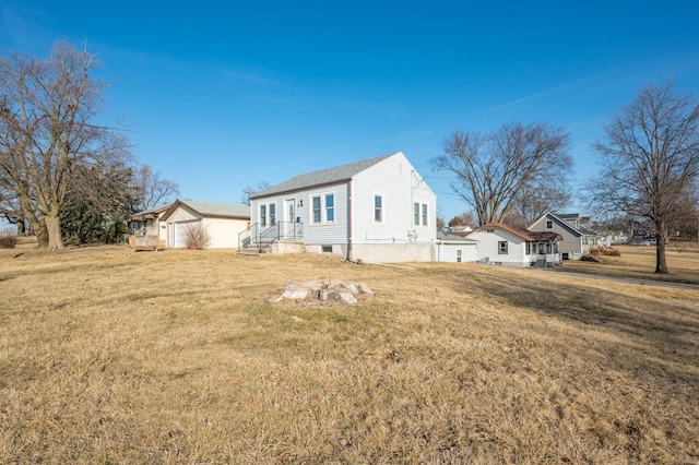 430 S 8th Ave E, Newton, IA 50208 - view of property exterior featuring a yard