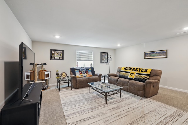 living room featuring recessed lighting, baseboards, light carpet, and visible vents