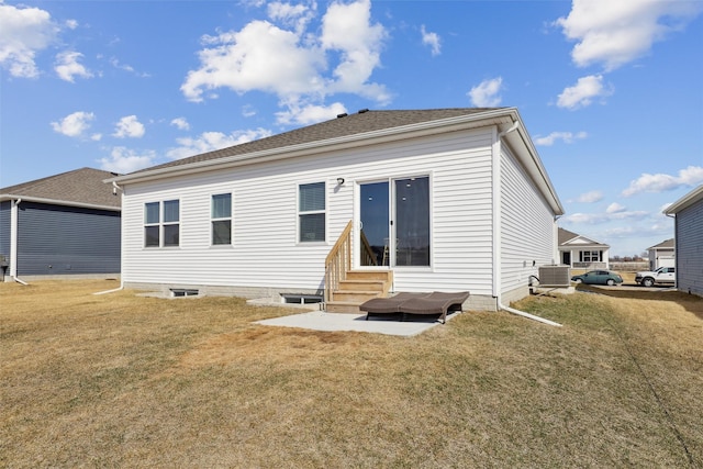 back of house with a yard, central AC, a shingled roof, and entry steps