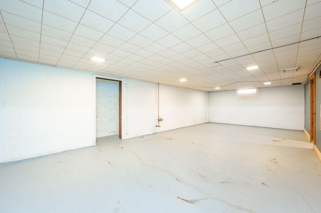 finished basement with concrete block wall